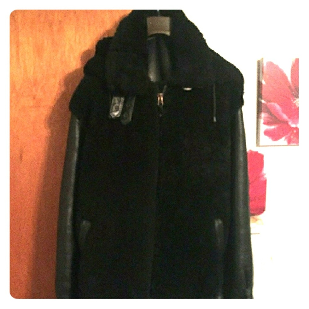 Black leather and natural shearling coat